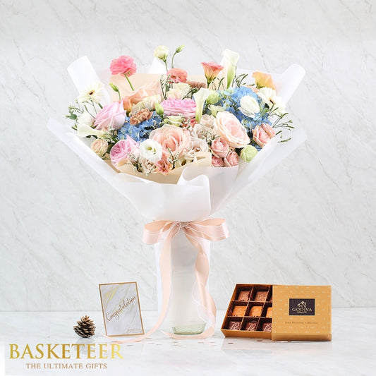 Luxury flower and chocolate gift set with pink roses, hydrangeas, calla lilies and artisan chocolates