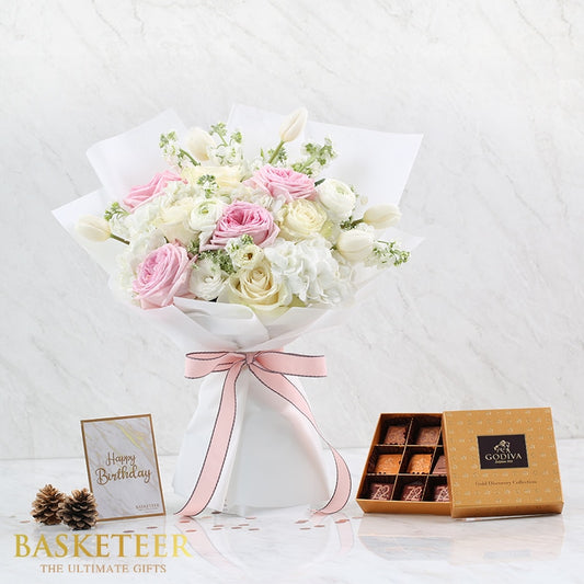 Luxury pink and white rose bouquet with assorted chocolates, birthday gift combo on marble