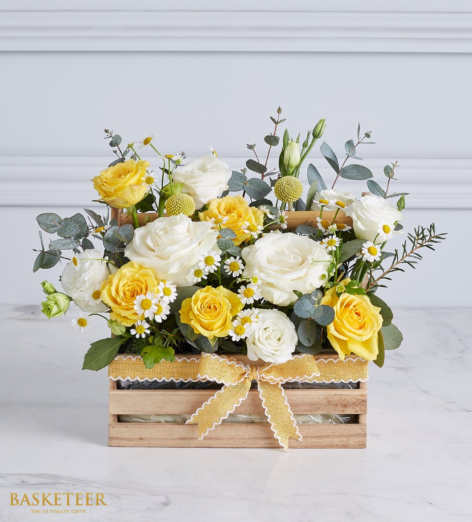 Sunshine Charm white and yellow rose arrangement with eucalyptus in rustic wooden crate, get well flowers