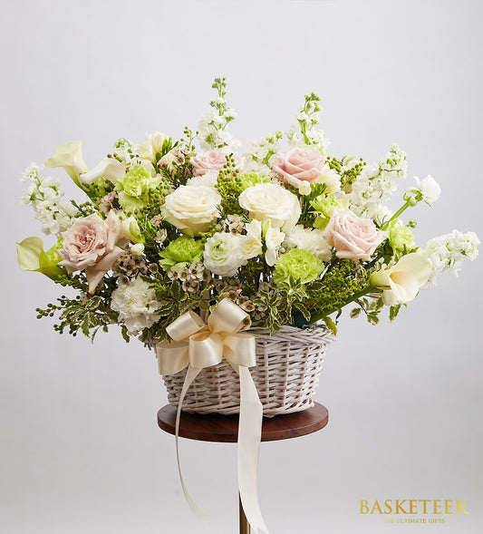 Shady Flowers soft pink and white rose basket with calla lilies and ranunculus for get well wishes