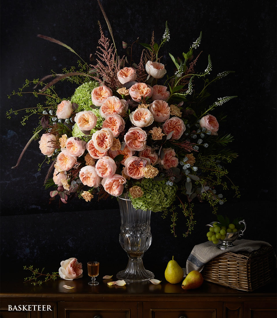 Premium peach and blush roses with hydrangeas in fluted glass vase