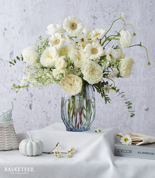 White roses and gerbera daisies in ribbed glass vase, premium fresh flowers for get well wishes