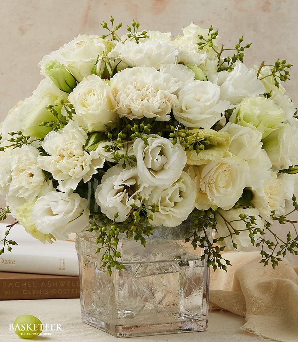 White and cream roses with carnations in frosted glass vase, premium fresh flower arrangement for any occasion