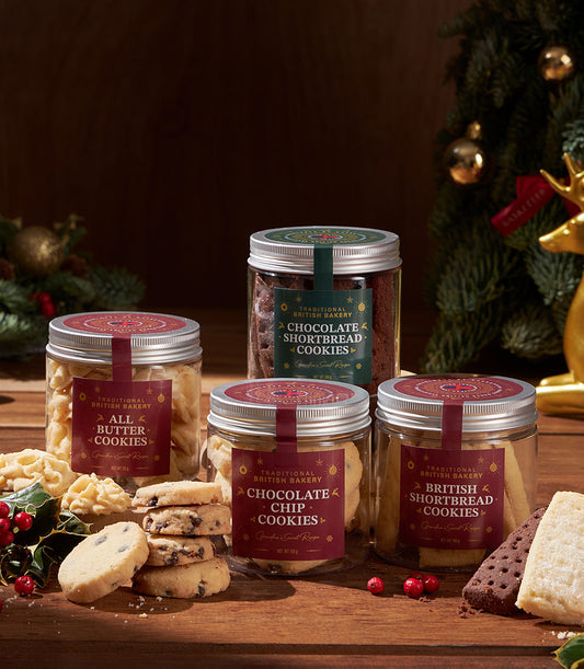 Classic British cookie collection in glass jars with chocolate shortbread, butter cookies, and shortbread for Christmas gifts