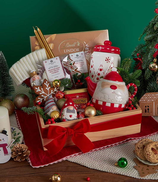 Luxury Christmas tea, cookie and chocolate gift set in wooden crate with Santa teapot, festive decorations and red velvet