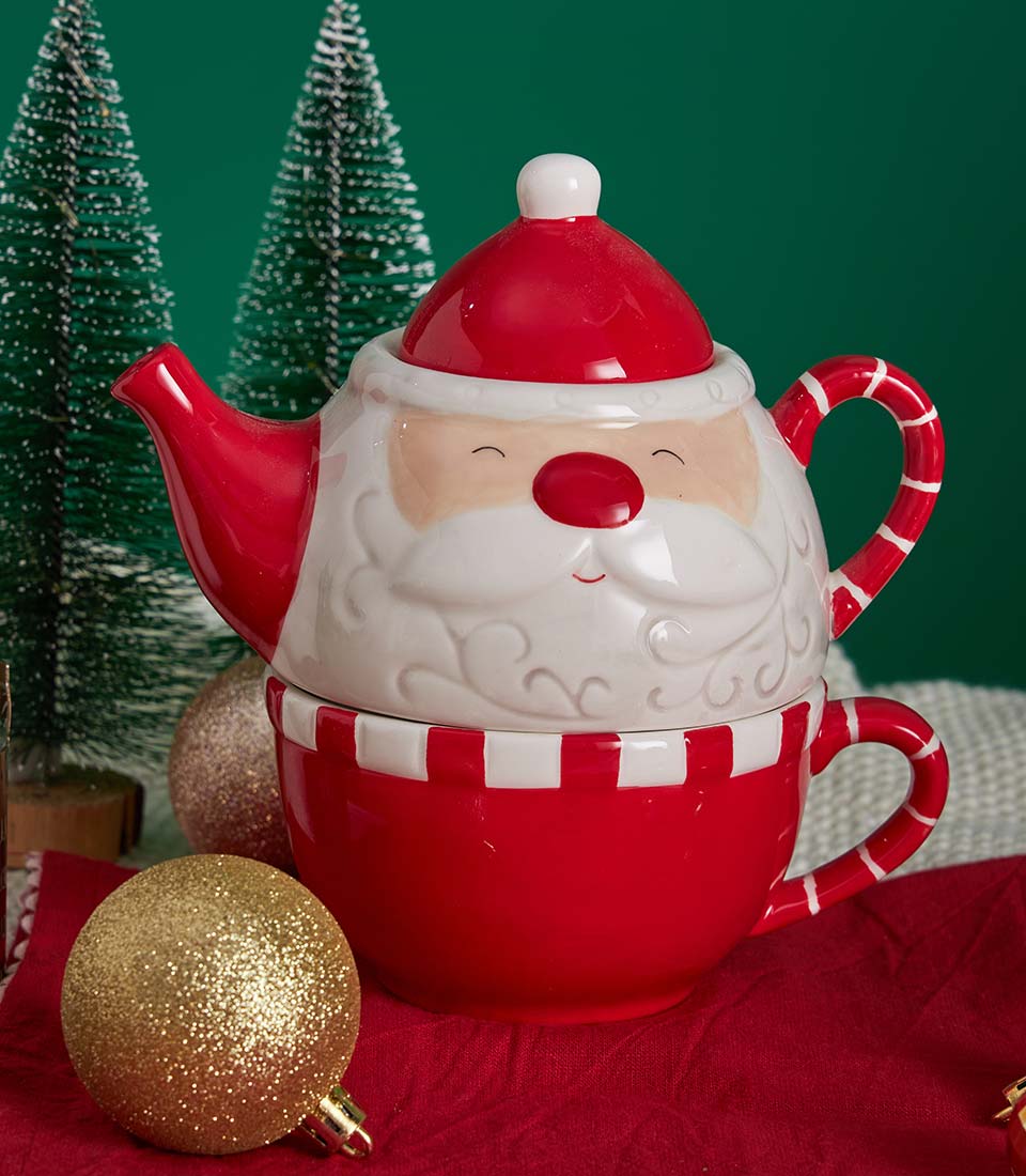 Santa teapot and striped cup set with gold ornaments and Christmas trees, festive luxury tea gift hamper