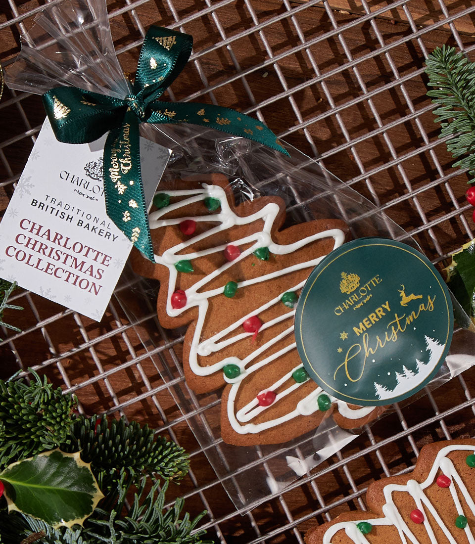 Charlotte Bakery gingerbread cookie, festive tree shape with icing. A British bakery Thailand treat, perfect as artisan cake order in Bangkok.