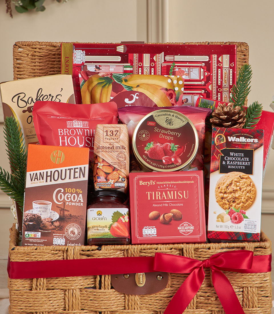 Premium red and gold gourmet gift basket with chocolates, biscuits, and festive treats for New Year celebrations