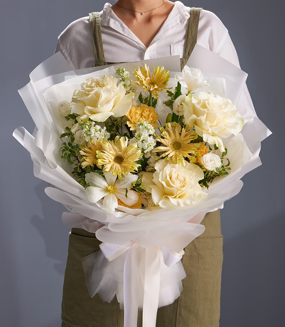 Ivory rose and cream gerbera bouquet with white satin ribbon wrap, premium fresh flower gift