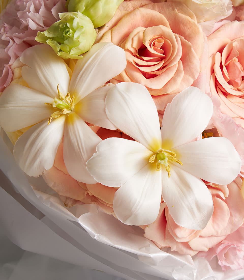 Serene Grace mixed bouquet with white star flowers, peach and pink roses, premium fresh arrangement