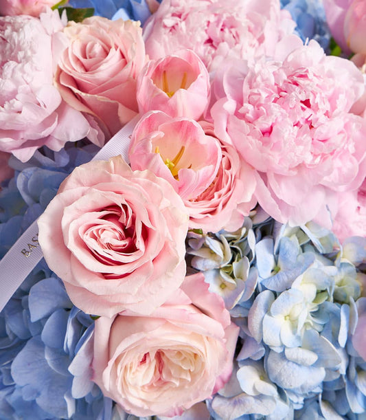 Blush peony and blue hydrangea bouquet with pink roses and tulips
