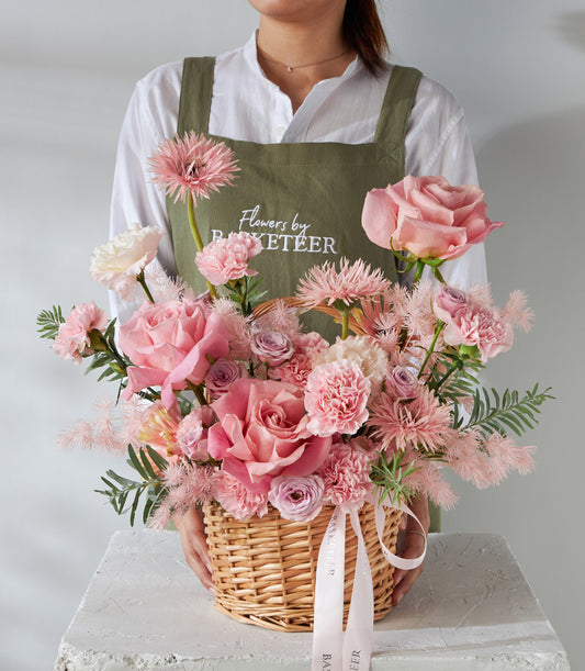 Luxury pink and white flower basket with roses, carnations, and daisies for birthday gifts