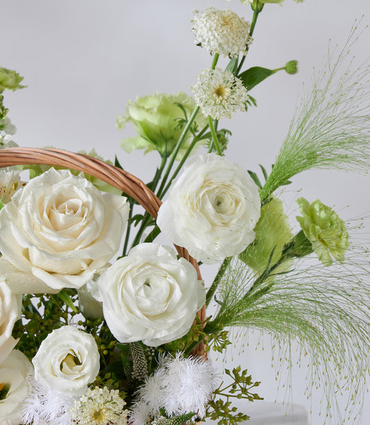 White and green rose flower basket with ranunculus and lisianthus, elegant birthday gift arrangement