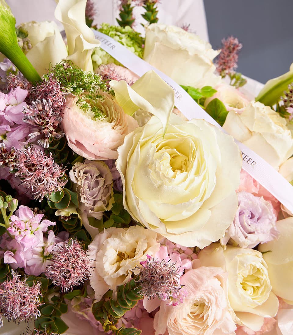 Ivory roses and calla lilies with ranunculus fresh flower bouquet for gifts