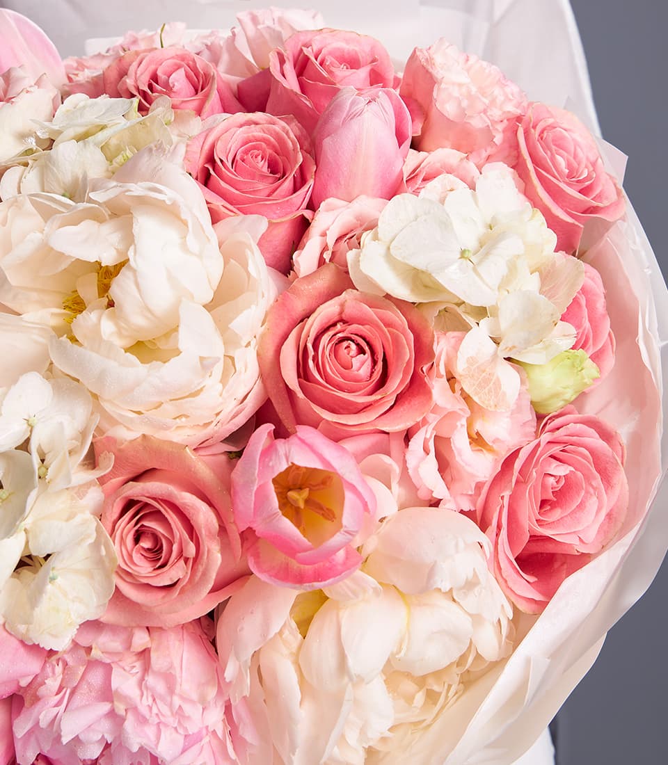 Blush pink rose peony hydrangea bouquet with white peonies and cream wrapping