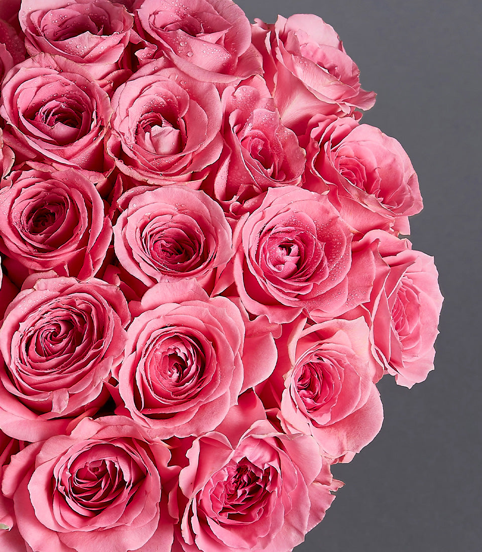 Premium pink roses with ranunculus and tulips in pearl leather flower box, fresh Ecuador-sourced blooms