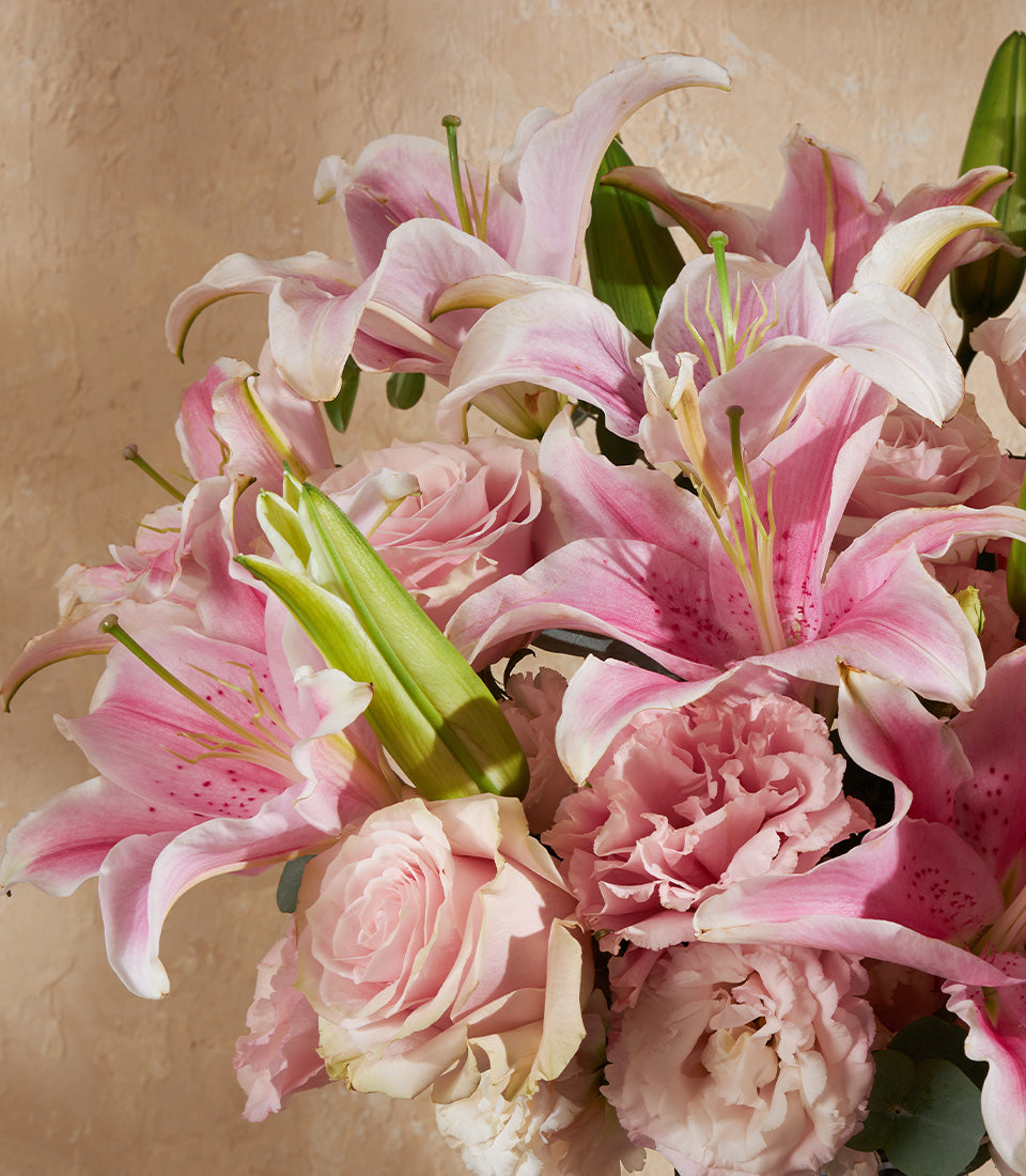 Pink lily and rose vase arrangement with carnations, fresh luxury flowers for gifting
