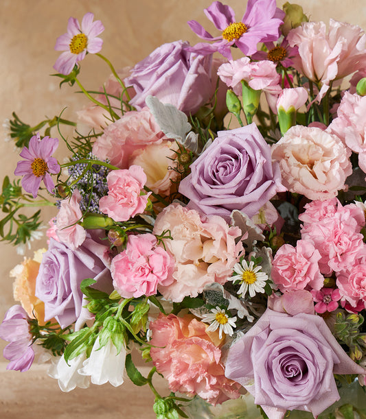 Enchanted Bloom purple and pink rose vase arrangement with cosmos and carnations