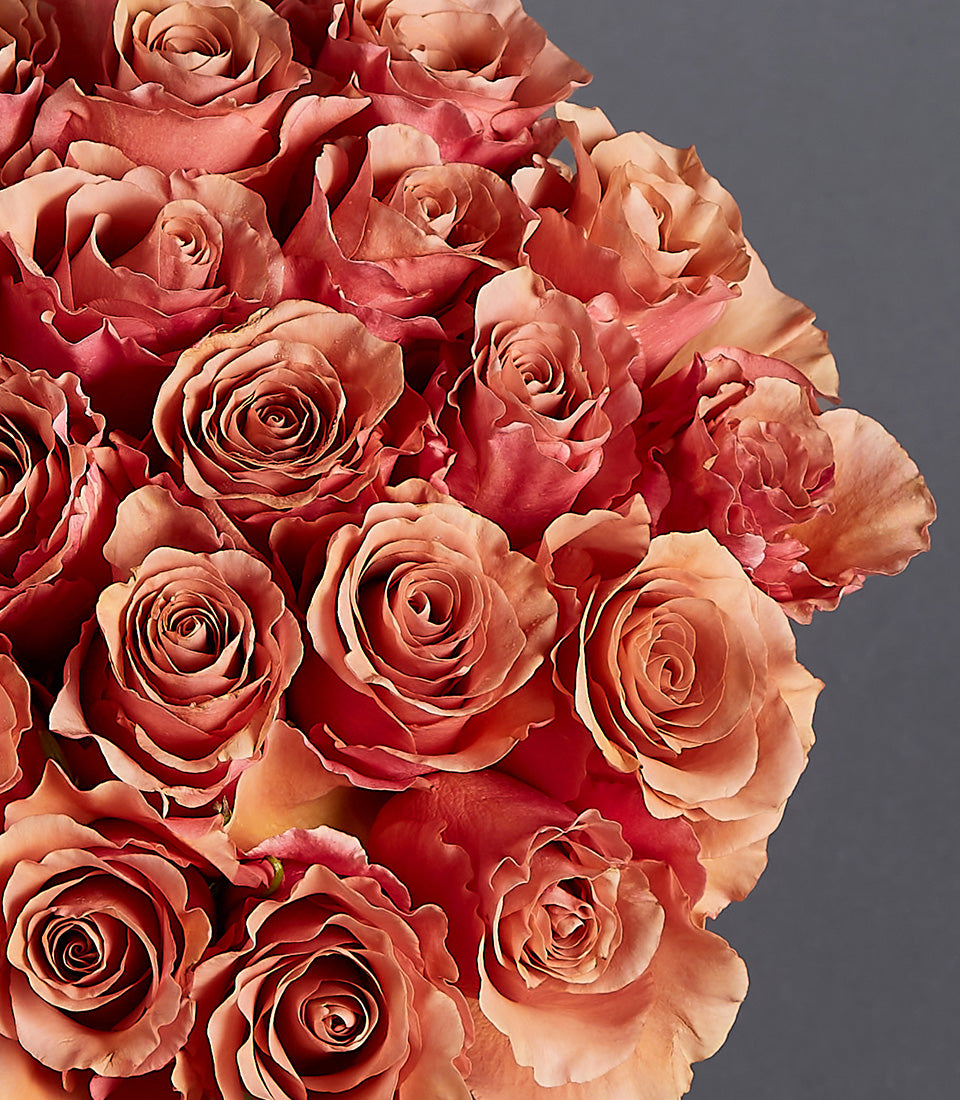 Luxe dusty rose and terracotta garden roses in premium vase arrangement