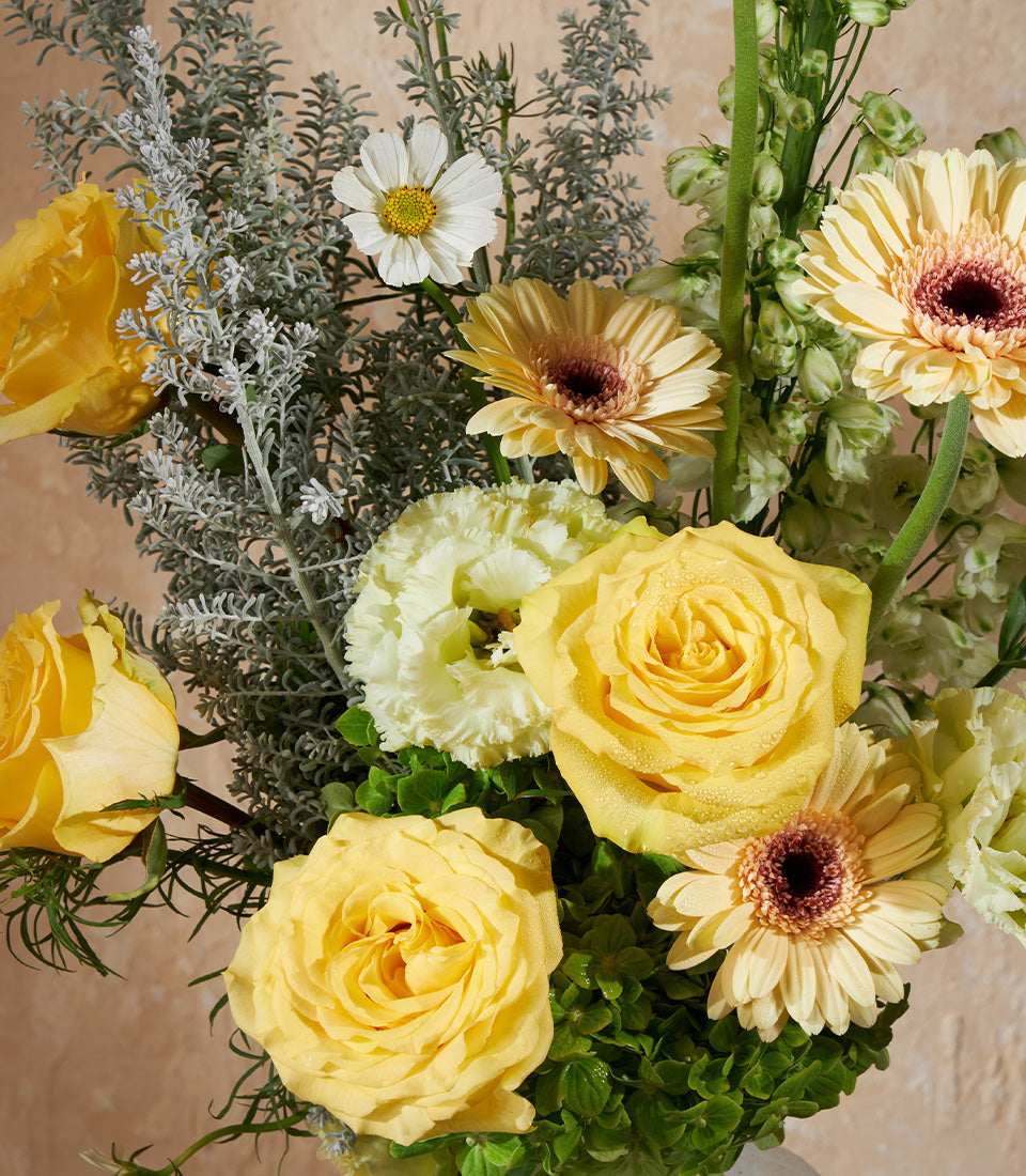 Yellow and white rose vase arrangement with gerbera daisies and lisianthus, premium fresh flowers for gifting