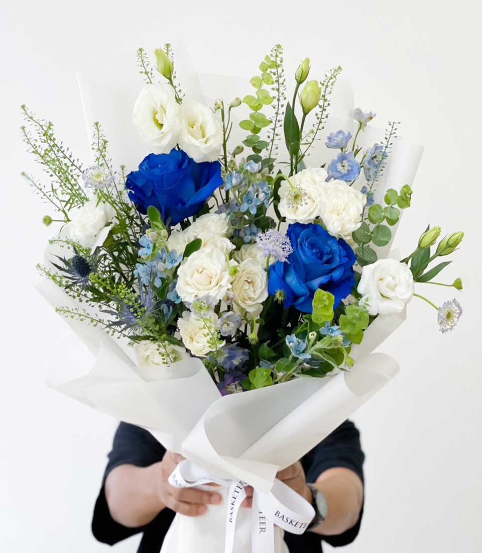 Premium blue and white rose bouquet with lisianthus, perfect for graduation or celebrating a special woman