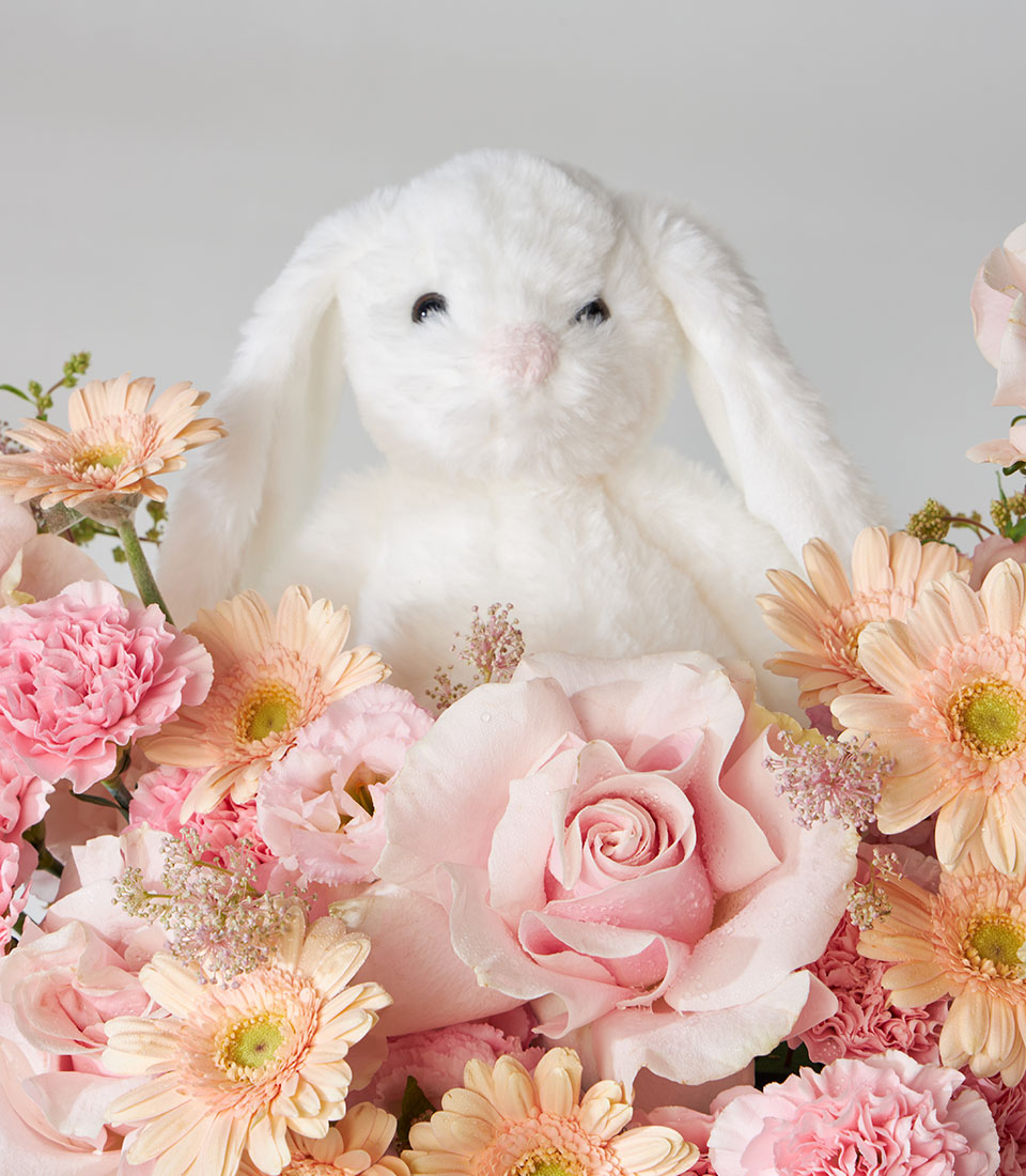 Pink Mondial roses with peach gerberas and Snow Bunny plush in luxury flower box, perfect birthday gift