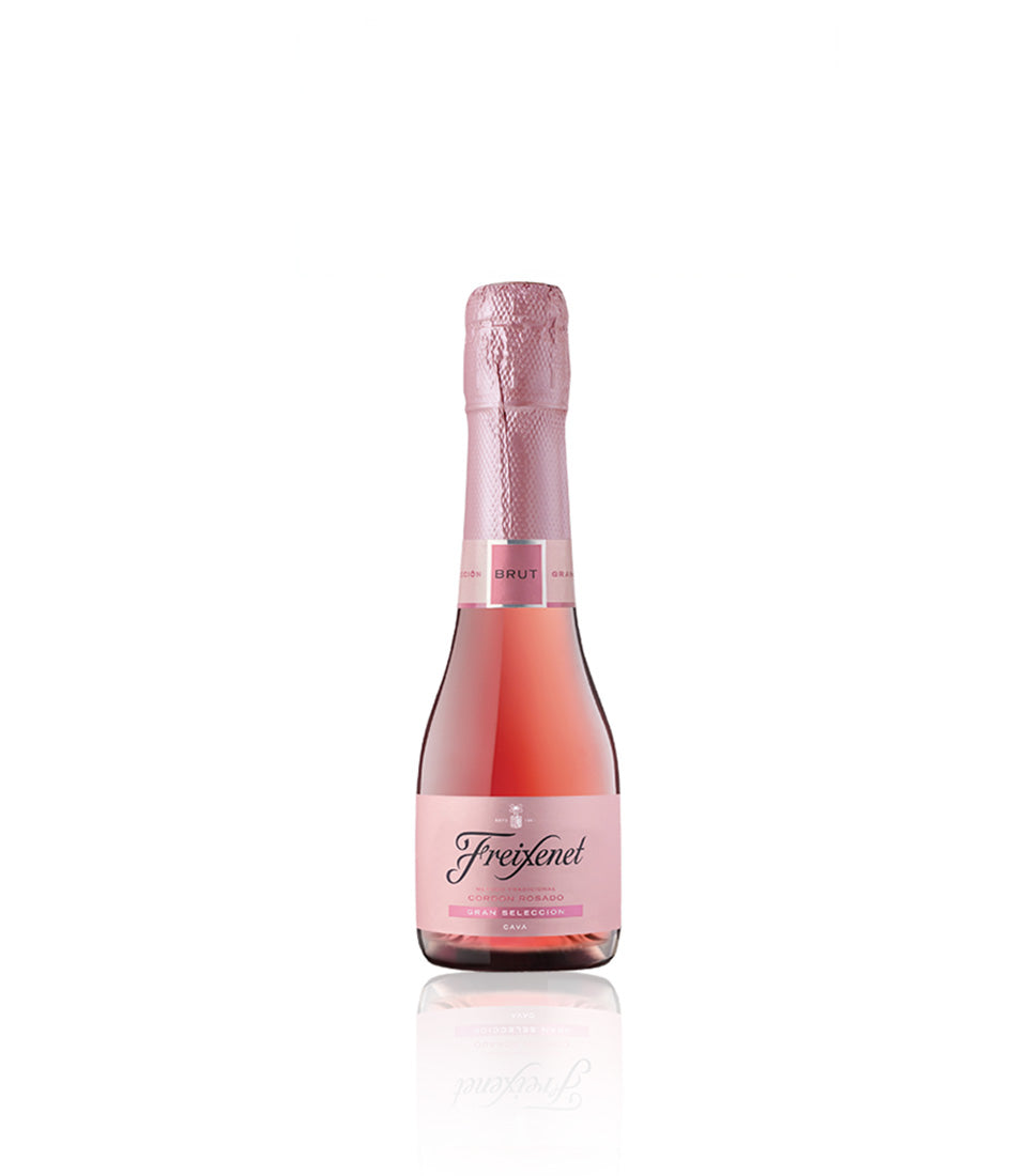 Pink Cava sparkling wine bottle with foil-wrapped cork, perfect for Christmas celebrations