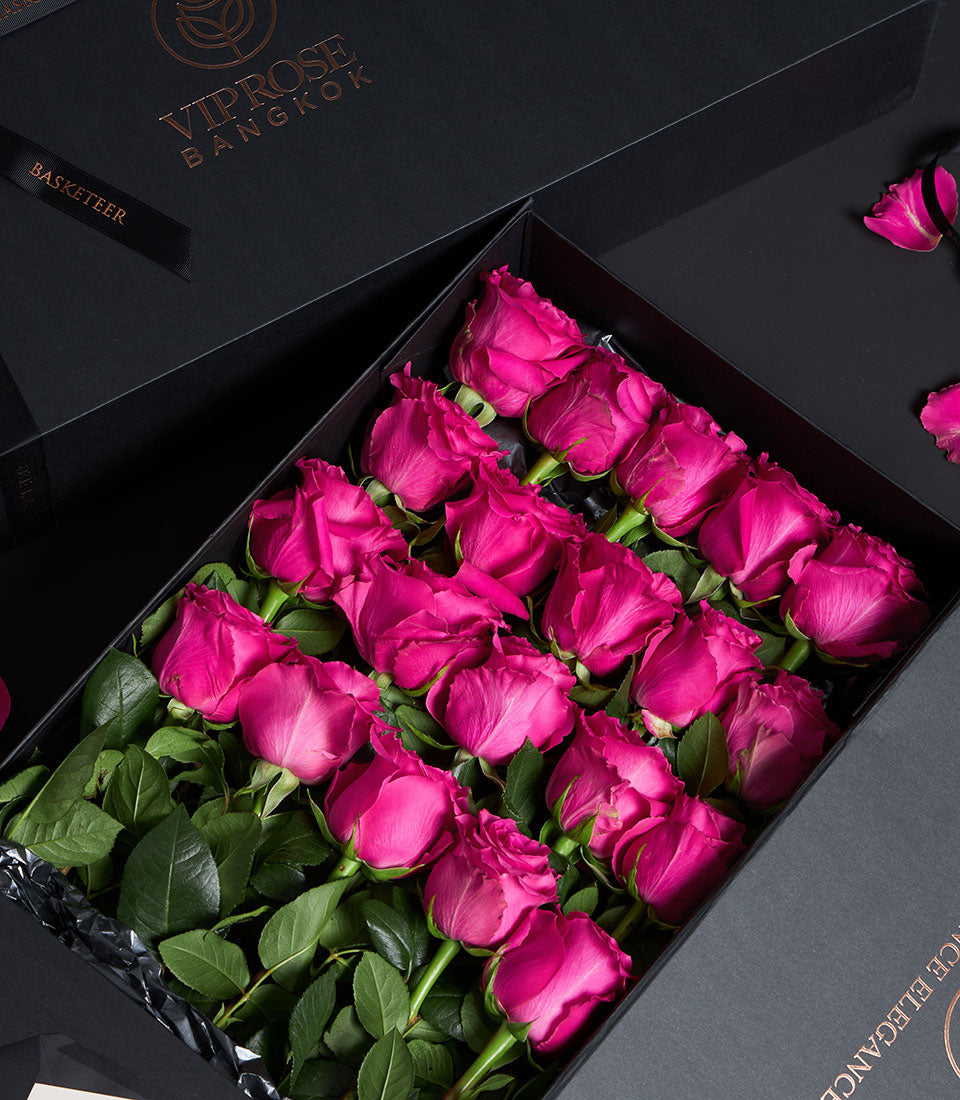 Luxury black gift box with twenty-four long-stemmed pink Ecuadorian roses for Valentine's Day