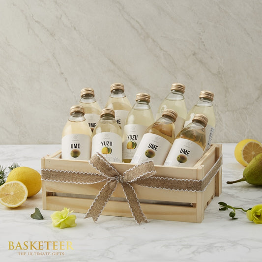 Premium hydration gift crate with Japanese fruit beverages, fresh lemons and pear, get well wellness hamper