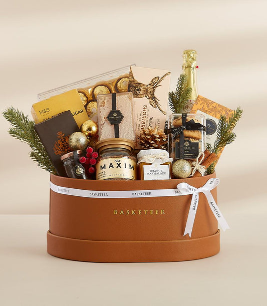 Luxury Merriment gift hamper in brown leather box with champagne, chocolates, and festive decorations for New Year