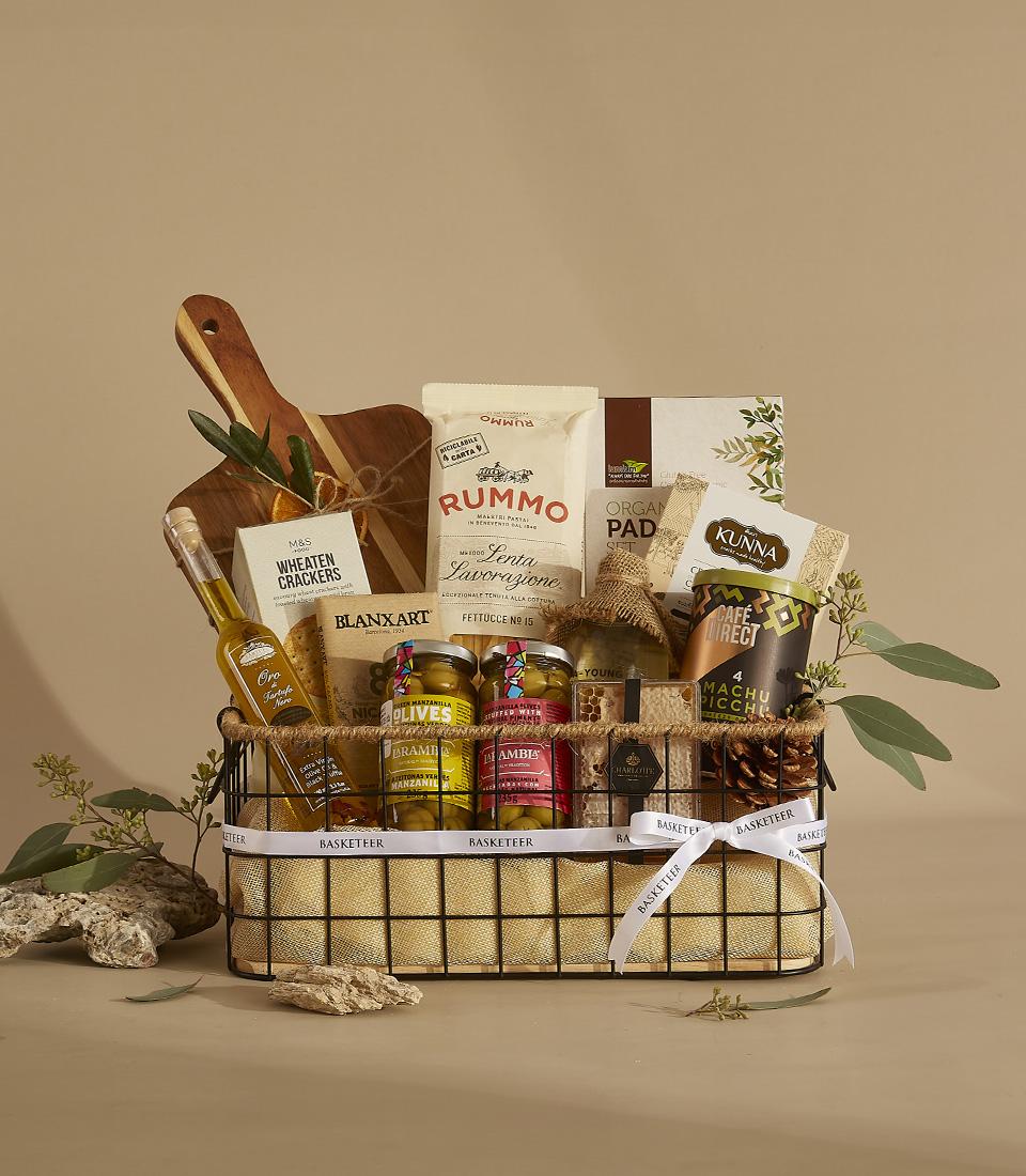 Countryside Charm black wire gourmet hamper with pasta, olives, coffee, and olive oil for New Year gifting
