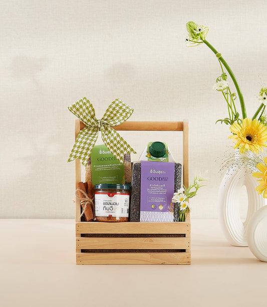 Wooden crate gift set with organic rice, salmon kimchi, cinnamon, and artisan provisions for New Year wellness