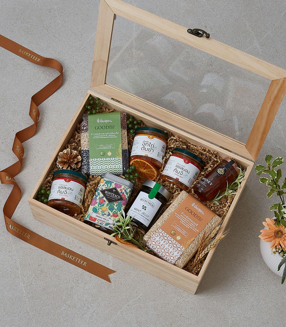 Premium wooden gourmet gift box with preserves, honey, tea, and rice for luxury gifting