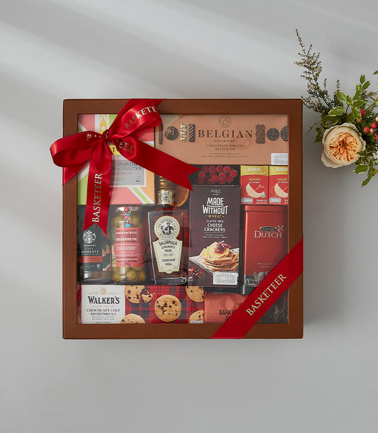 European gourmet selection gift box with Belgian chocolate, Dutch treats, and artisan delicacies in luxury brown