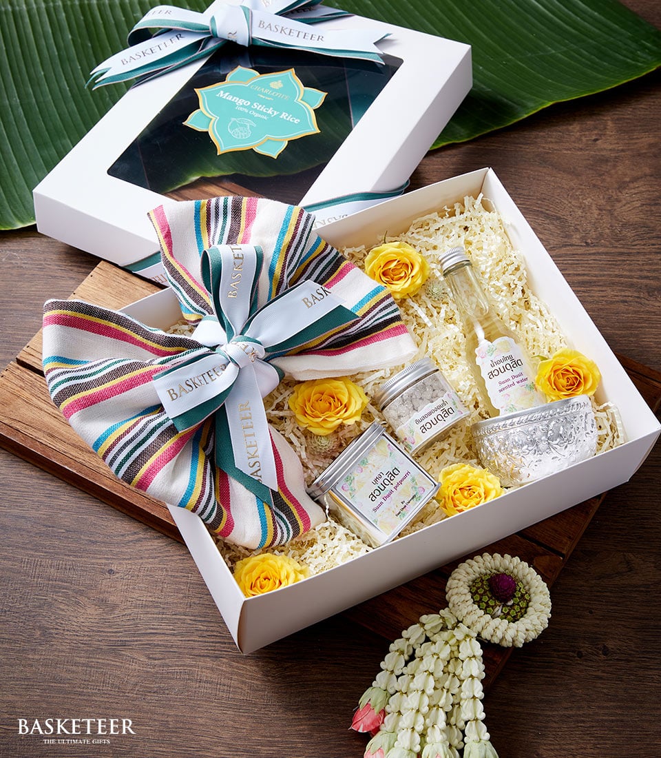 Luxury Thai perfume gift set with scented water, salt, and potpourri in white presentation box, Thai New Year Songkran
