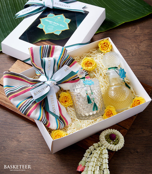 Thai traditional perfume gift set with glass jar, scented water bottle, and yellow roses in luxury Basketeer box for Songkran