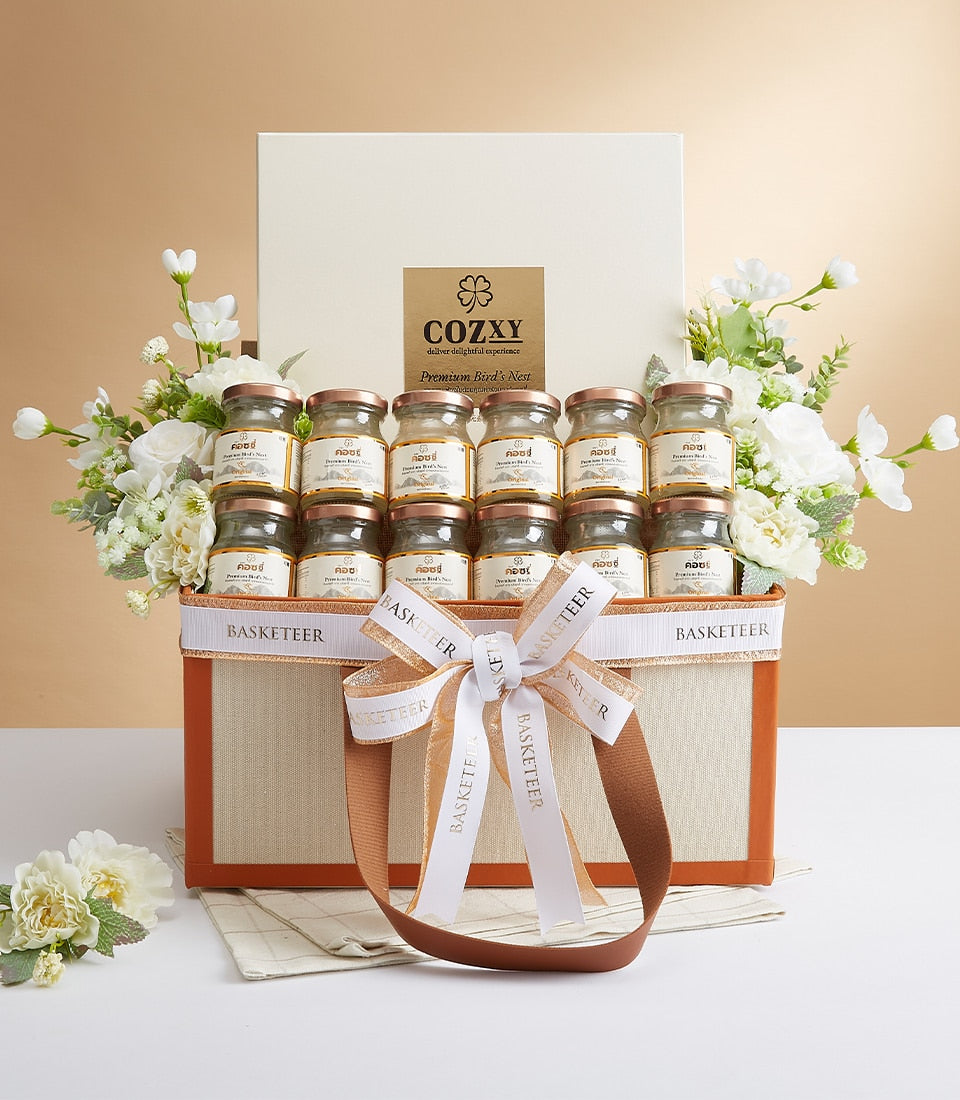 Premium bird's nest gift basket with white flowers and rose gold jar accents