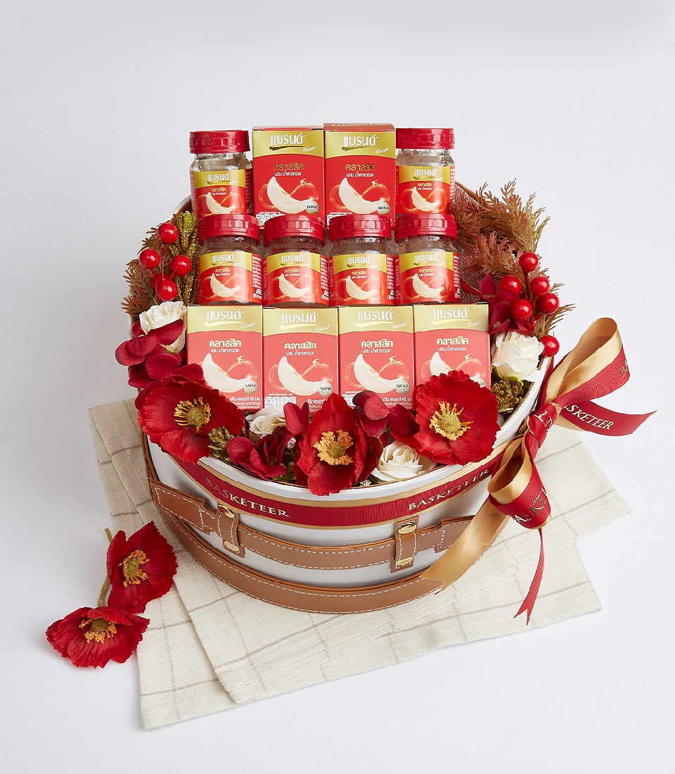 Premium red and white bird's nest gift basket with luxury gourmet items and fresh flowers