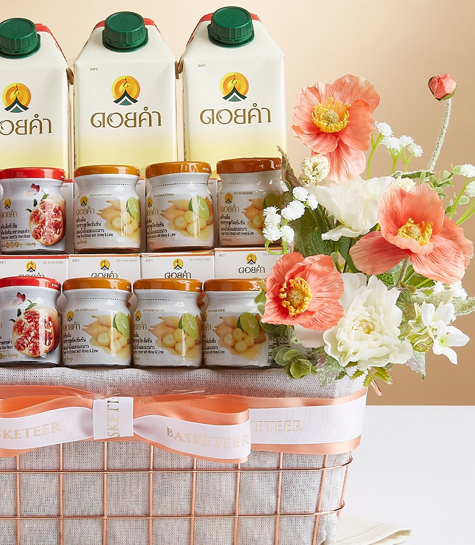 Luxury Doi Kham Highland gift basket with artisan Thai wellness products, pomegranate and ginger jars, peach poppies and