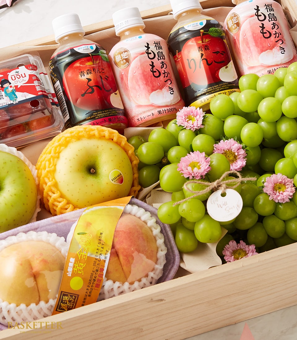 Premium fruit gift box with green grapes, peaches, apples and artisan fruit juices, get well soon gift