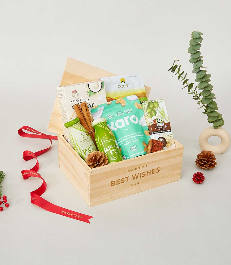 Deluxe gourmet hamper in timber box with cashews, jasmine rice, and artisan treats for New Year gifting