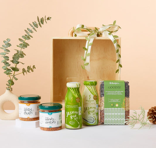 Healthful Treasures wellness gift box with Thai curry pastes, jasmine rice beverages, multi-grain rice, and natural green