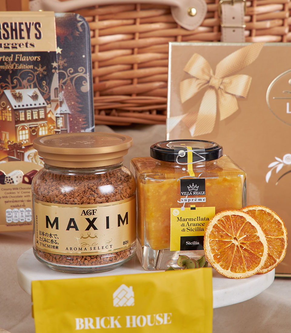 Luxury gourmet hamper with Italian marmalade, specialty coffee, and artisan treats for New Year gifting