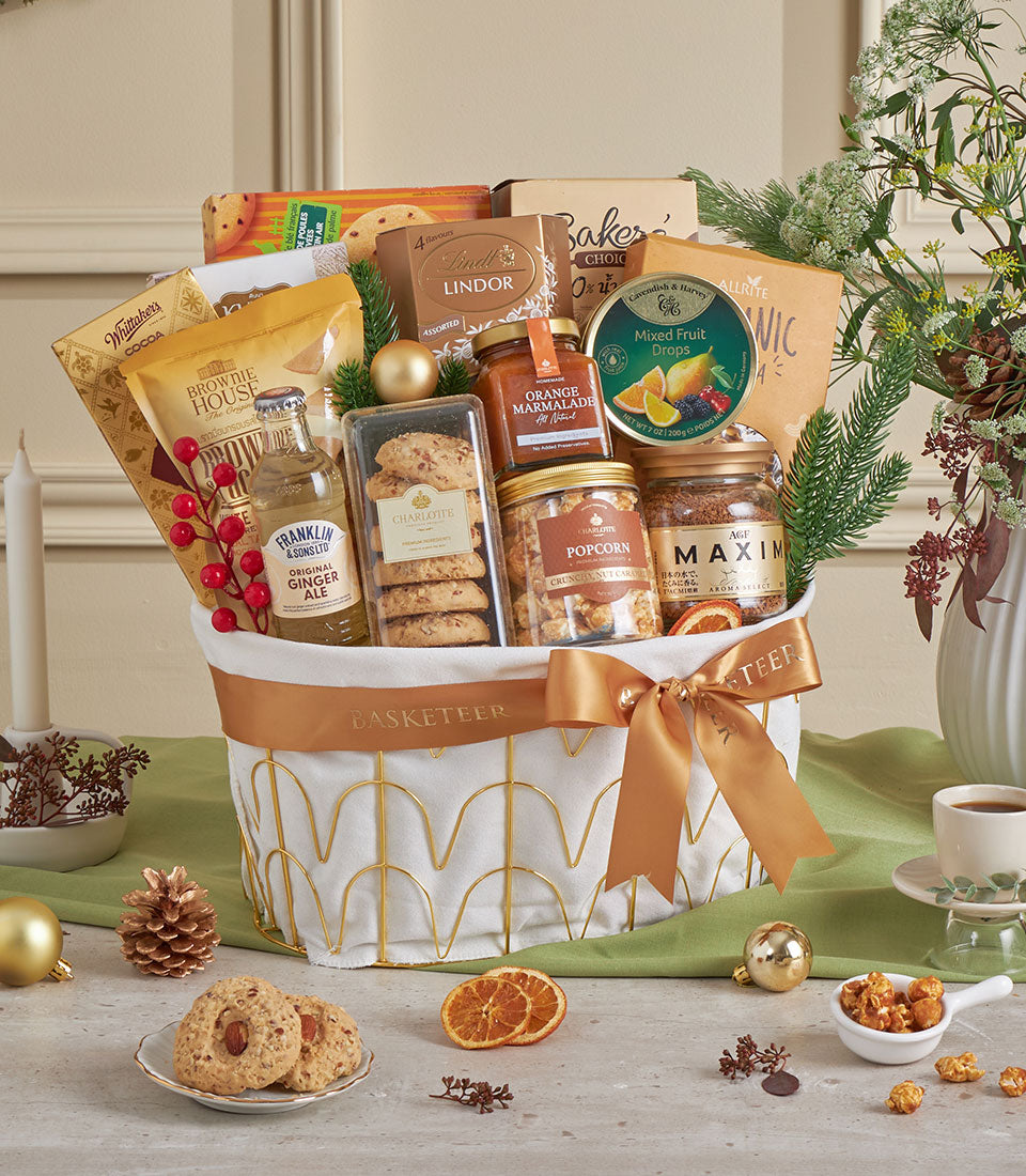 Luxury golden gift basket filled with gourmet chocolates, jams, and treats for New Year celebrations