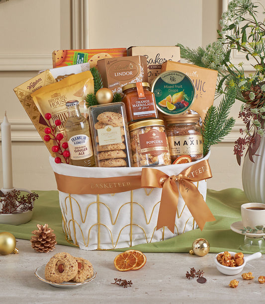 Luxury golden gift basket filled with gourmet chocolates, jams, and treats for New Year celebrations