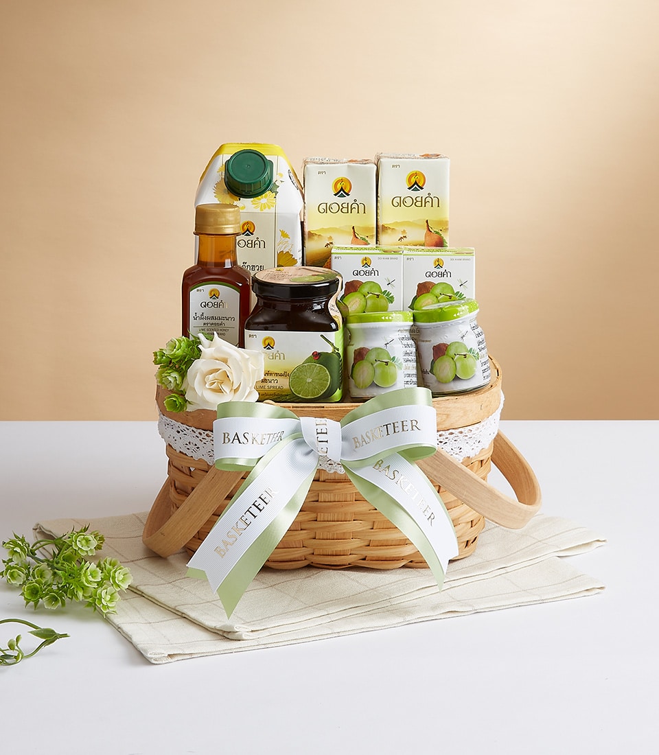 Doi Kham mixed selection gourmet gift basket with preserved fruits, jams, and artisan Thai products in woven basket with
