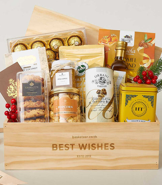 Premium gourmet gift crate with chocolates, cookies, jam, and artisan snacks in wooden "Best Wishes" box for New Year