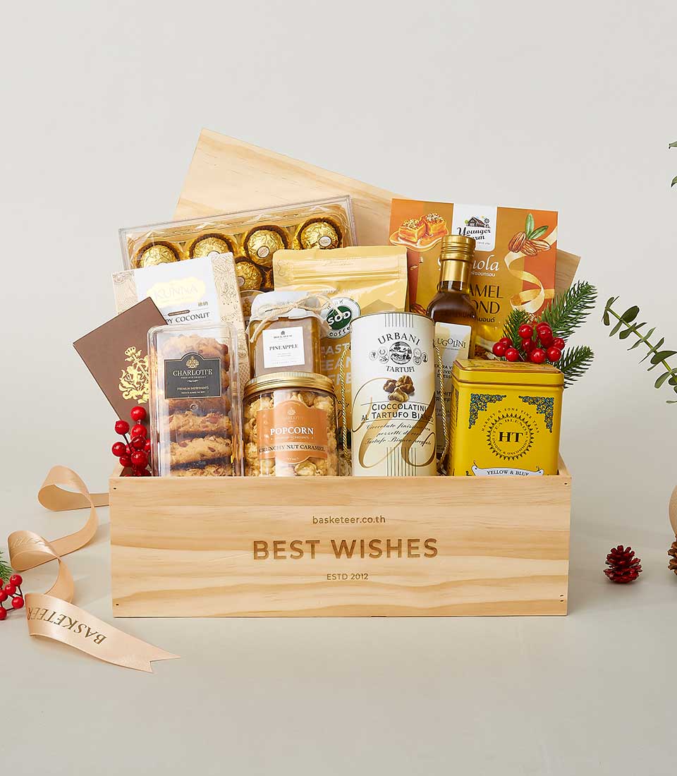 Luxury New Year wellness gift basket in wooden crate with gourmet chocolates, preserves, and artisan treats