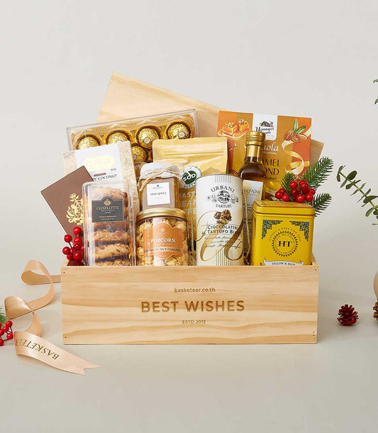 Luxury New Year wellness gift basket in wooden crate with gourmet chocolates, preserves, and artisan treats
