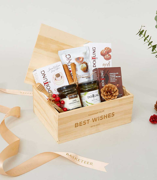 Light wood gift box with macadamia honey, matcha spread, coffee beans, drip coffee, and artisan gourmet treats with gold